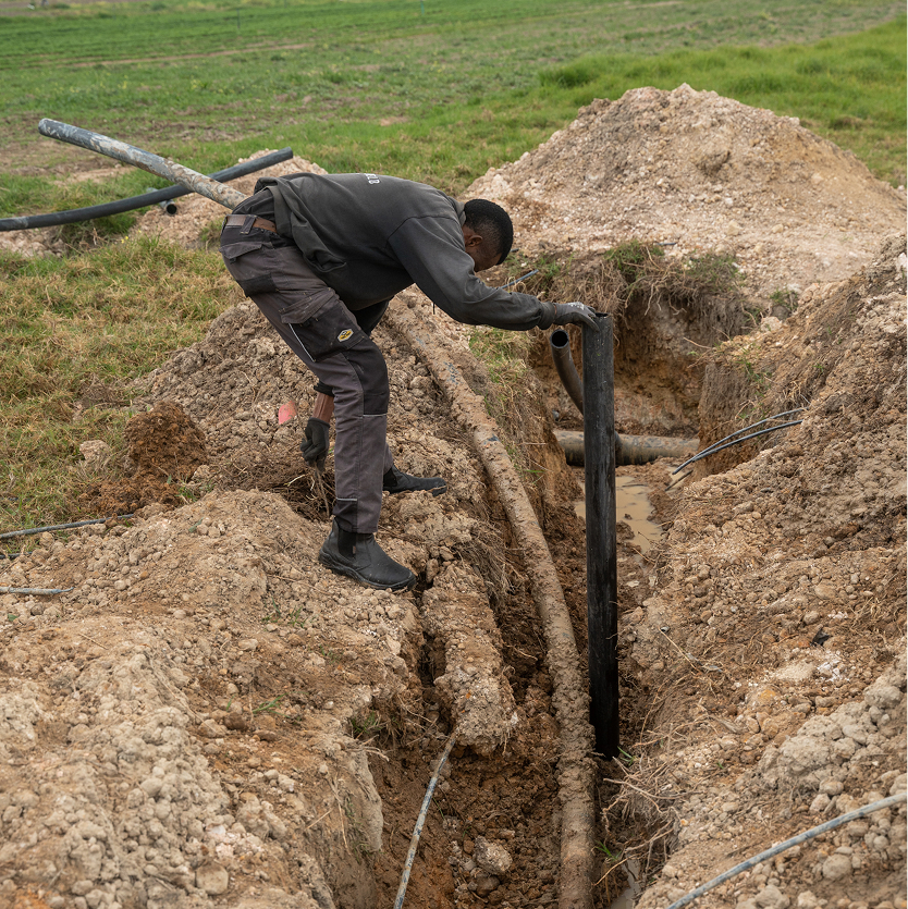 Technician working at a water treatment plant site